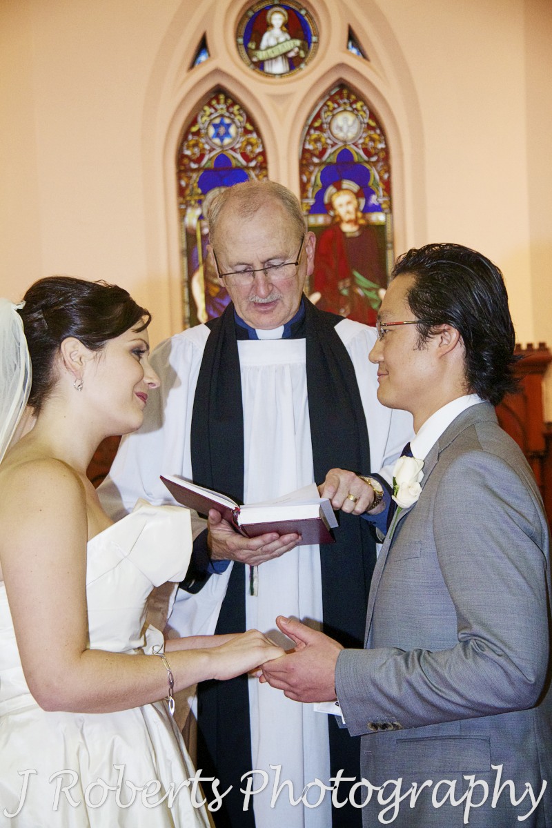 Bride & Groom exchanging vows - wedding photography sydney
